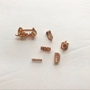 Set of rose gold charms